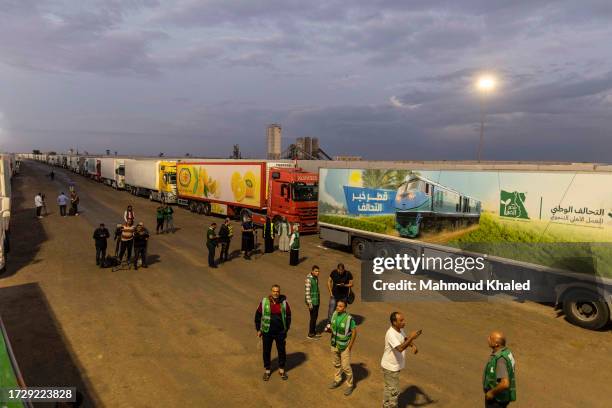 Aid convoy trucks are seen at Rafah border on October 17, 2023 in North Sinai, Egypt. The aid convoy, organized by a group of Egyptian NGOs, set off...