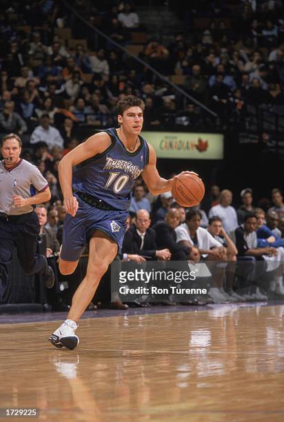 Wally Szczerbiak of the Minnesota Timberwolves advances the ball during the game against the Toronto Raptors at Air Canada Centre on January 12, 2003...