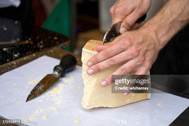 cutting cheese - crumbly cheese stock pictures, royalty-free photos & images