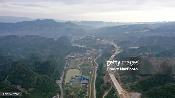 Photo taken on October 17, 2023 shows the Liuzhi-Anlong Expressway under construction in Qianxinan, Guizhou Province, China.