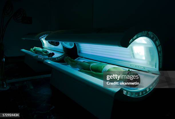 tanning bed - tanning bed stock pictures, royalty-free photos & images