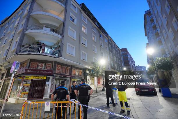 Local police officers in the vicinity of the building where the fire occurred, in Alfonso X el Sabio street in Vigo, on 11 October, 2023 in Vigo,...