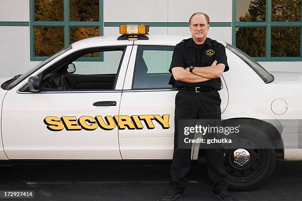 serious security officer - security guard stock pictures, royalty-free photos & images