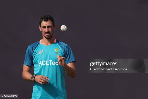 Mitchell Starc of Australia prepares to bowl during an Australian training session at the ICC Men's Cricket World Cup India 2023 at the BRSABVE...