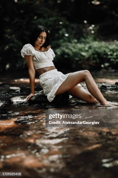 cold river water bath for beautiful female - wood sprite stock pictures, royalty-free photos & images