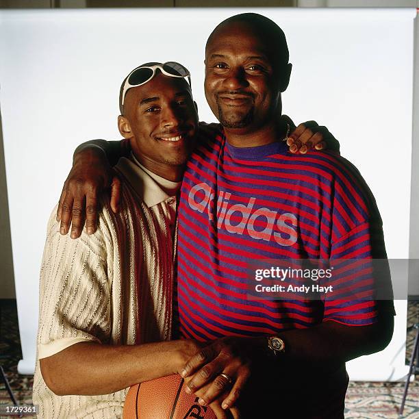 Kobe Bryant and his father pose for a portrait. NOTE TO USER: User expressly acknowledges and agrees that, by downloading and/or using this...