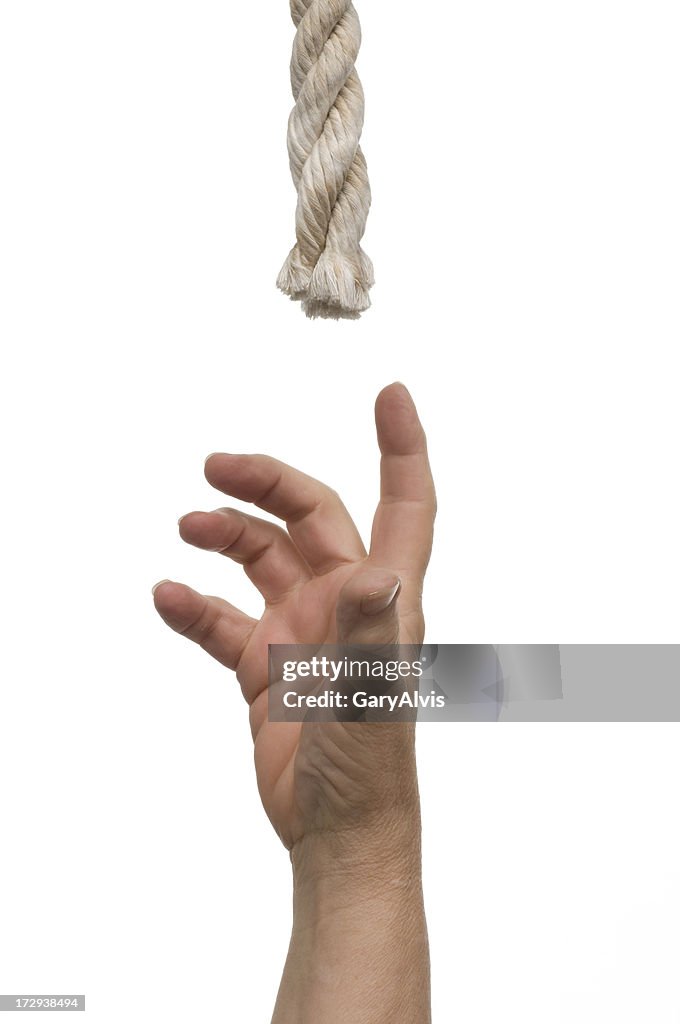 Let Go Rope Hand Hand Reaching Forletting Go Of End Of A Rope High-Res Stock Photo ...