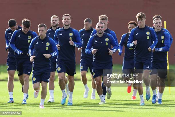 Players of Scotland warm up during a training session at Lesser Hampden on October 11, 2023 in Glasgow, Scotland.