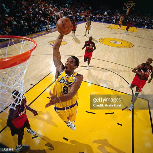 Kobe Bryant of the Los Angeles Lakers soars to the basket during a game against the Minnesota Timberwolves at the Staples Center on January 1, 1998...