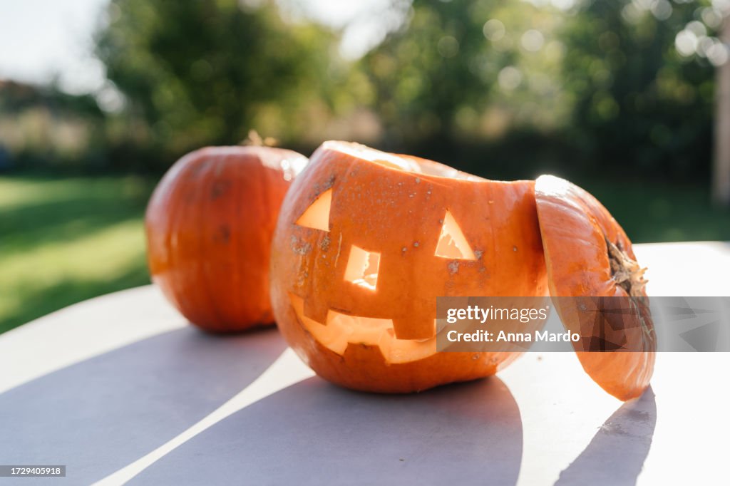 Freshly cut Halloween pumpkin with a spooky face.