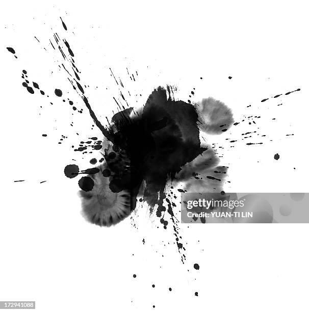 ink wash painting splatter on a white background - pen en inkt stockfoto's en -beelden