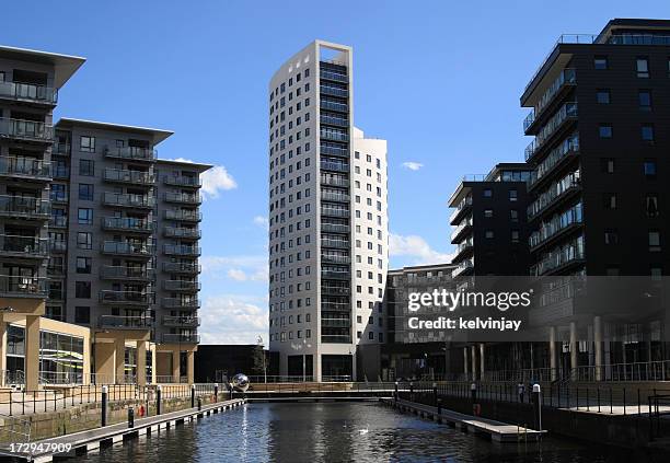 modern luxury apartments - leeds canal stock pictures, royalty-free photos & images