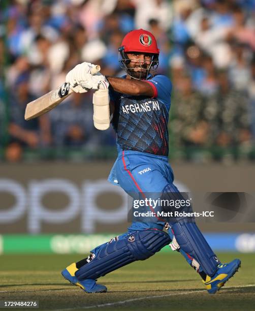 Hashmatullah Shahidi of Afghanistan plays a shot during the ICC Men's Cricket World Cup India 2023 between India and Afghanistan at Arun Jaitley...