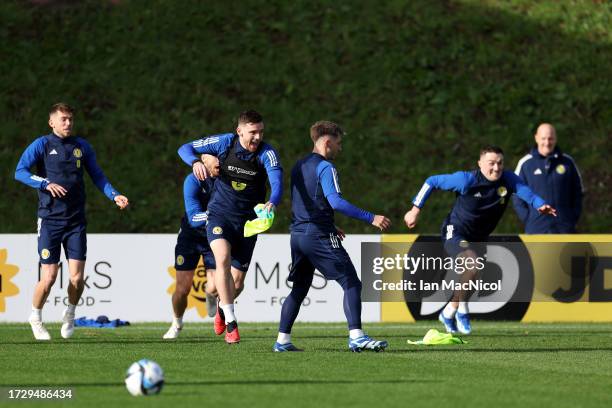 Andrew Robertson of Scotland reacts during training session at Lesser Hampden on October 11, 2023 in Glasgow, Scotland.