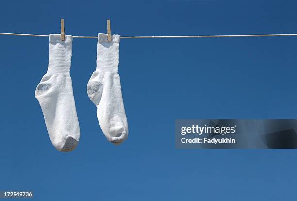 hang in there socks - clothesline stockfoto's en -beelden