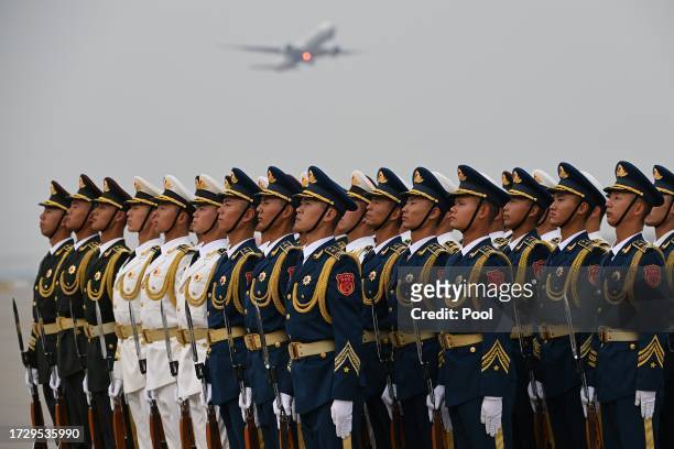 Chinese honour guards are seen before the arrival of Turkmenistan's delegation at Beijing's airport ahead of the Belt and Road Forum in the Chinese...