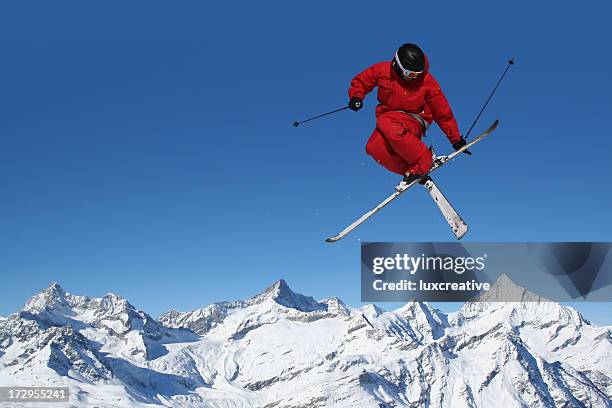 skiing - skier jumping stock pictures, royalty-free photos & images