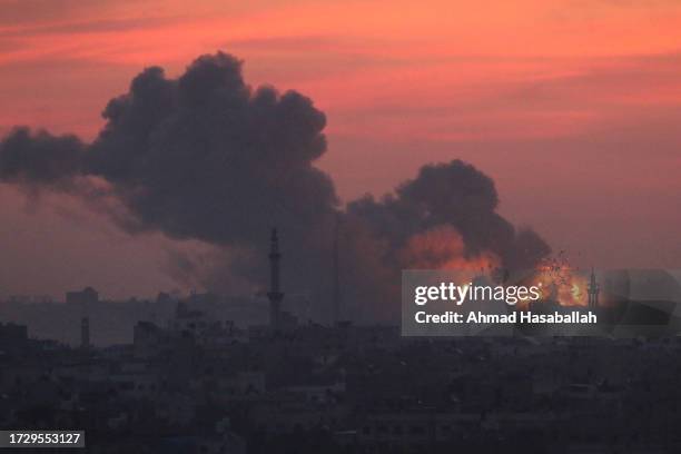 Explosion and smoke caused by Israeli air raids seen on October 11, 2023 in Gaza City, Gaza. Almost 800 people have died in Gaza, and 187, 000...