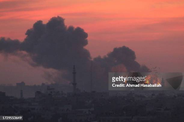 Explosion and smoke caused by Israeli air raids seen on October 11, 2023 in Gaza City, Gaza. Almost 800 people have died in Gaza, and 187, 000...