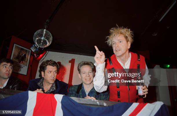 The Sex Pistols answer questions during a press conference held at the 100 Club for the the band's reunion and 'Filthy Lucre Tour', London, 18th...