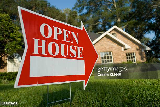 red open house sign pointing at house for inspection - yard sign stock pictures, royalty-free photos & images