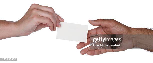 one hand passing a blank business card to another - business card stock pictures, royalty-free photos & images