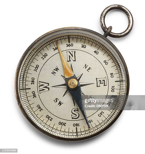 brújula aislado sobre un fondo blanco - compass fotografías e imágenes de stock