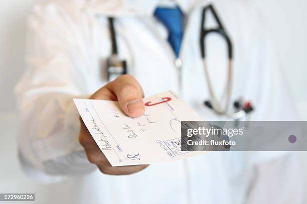 here's your prescription! - prescription medicine stock pictures, royalty-free photos & images