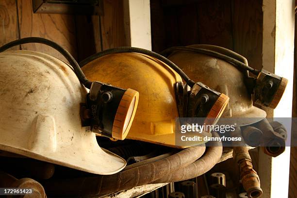mine helmets - mining hats stock pictures, royalty-free photos & images