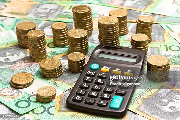 adding up the profits - australian economy stock pictures, royalty-free photos & images