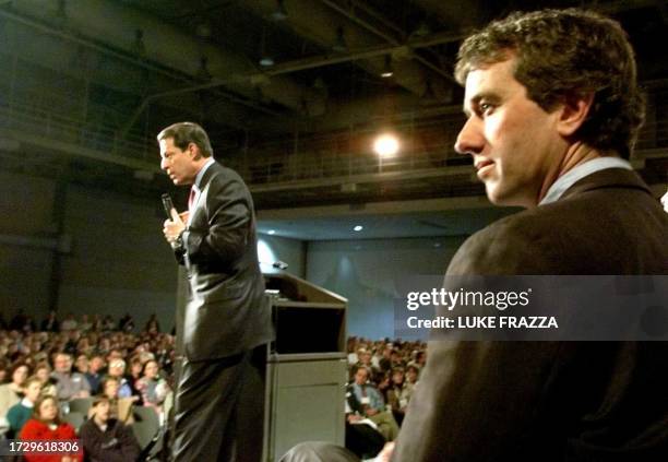 Democratic presidential hopeful US Vice President Al Gore speaks as environmental activist and lawyer Robert Kennedy Jr. Listens during a speech to...