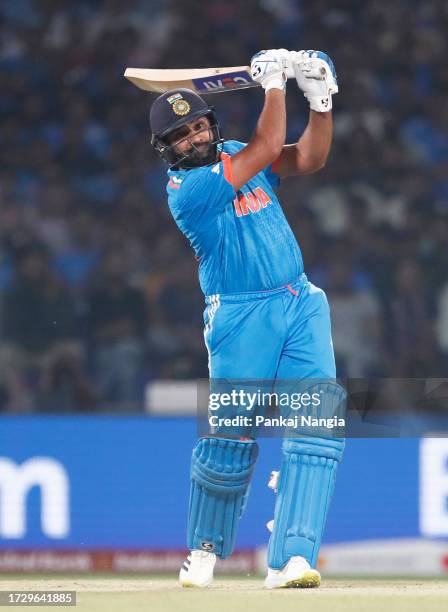 Rohit Sharma of India plays a shot during the ICC Men's Cricket World Cup India 2023 between India and Afghanistan at Arun Jaitley Stadium on October...