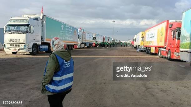 Trucks loaded with humanitarian aid supplies are seen at the Rafah crossing to be transported to Gaza Strip from Rafah, Egypt on October 17, 2023.