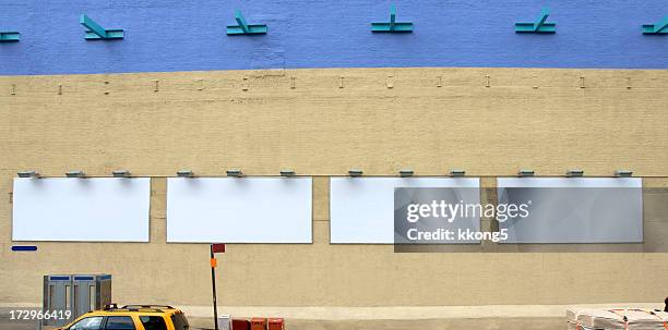 multiple advertising billboard space in manhattan ny - new york city wall stock pictures, royalty-free photos & images