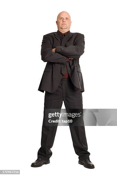 a large bouncer in a suit with his arms crossed - bouncer stock pictures, royalty-free photos & images