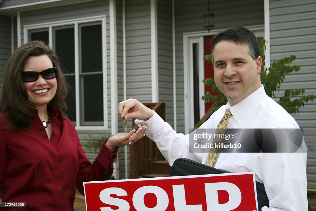 Real Estate Agent with Client