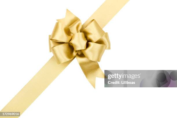gold bow gift (clipping path) (xxl) - gold present stock pictures, royalty-free photos & images