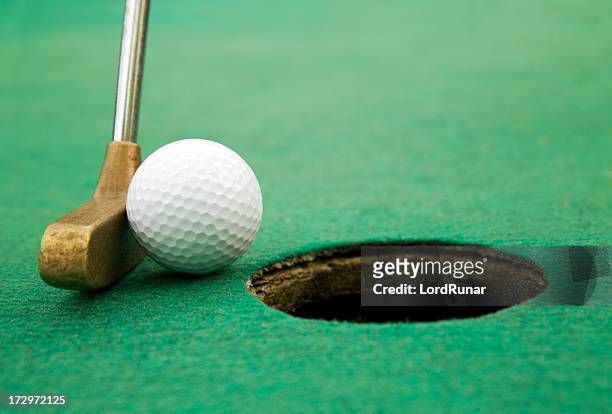 final putt - golf short iron stock pictures, royalty-free photos & images