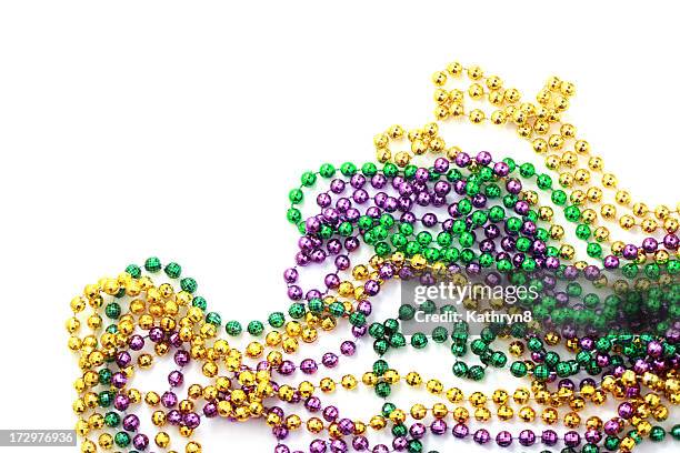 mardi gras beads - fat tuesday stock pictures, royalty-free photos & images