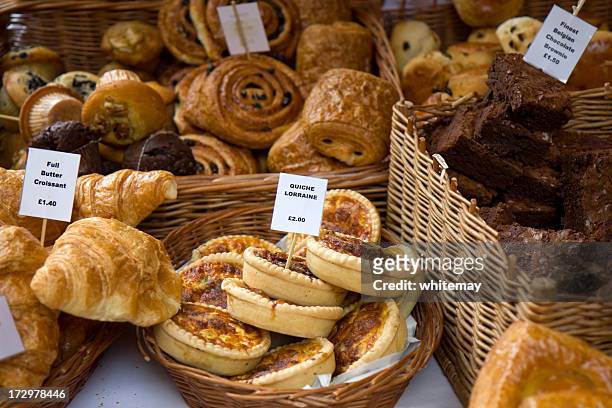 assorted pastries for sale displayed in wicker baskets - product variation stock pictures, royalty-free photos & images