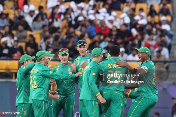 Kagiso Rabada of South Africa celebrates the wicket of Netherlands' Bas De Leede during the ICC Men's Cricket World Cup 2023 match between South...