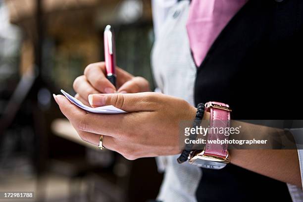 waitress taking order - order pad stock pictures, royalty-free photos & images