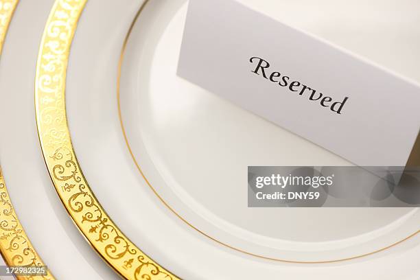 reserved table tent on top of table setting - luxury table setting stock pictures, royalty-free photos & images