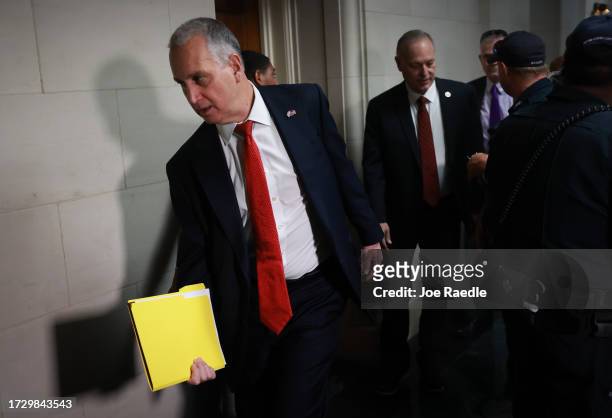 Rep. Mario Diaz-Balart walks in the hallway as House Republicans meet to vote on a new Speaker of House in the Longworth House Office Building on...