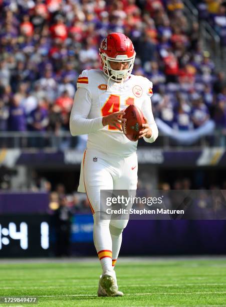 James Winchester of the Kansas City Chiefs warms up before the game against the Minnesota Vikings at U.S. Bank Stadium on October 8, 2023 in...