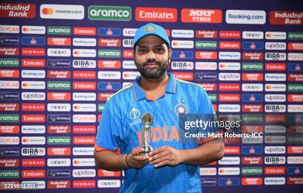 Rohit Sharma of India poses after being named Player of the Match following the ICC Men's Cricket World Cup India 2023 between India and Afghanistan...