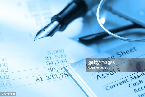 close up of fountain pen on a balance sheet - bank statement stock pictures, royalty-free photos & images