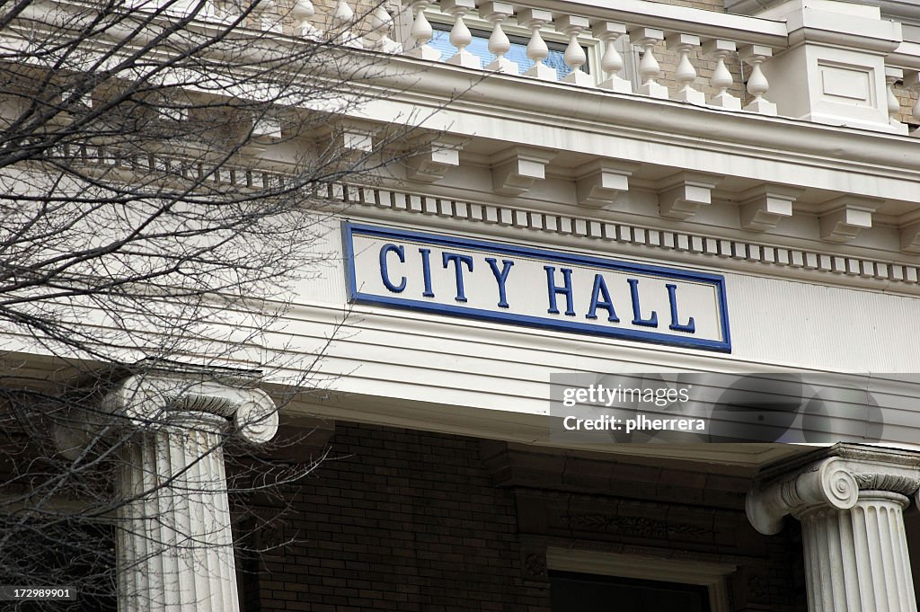 City Hall sign on a fancy building