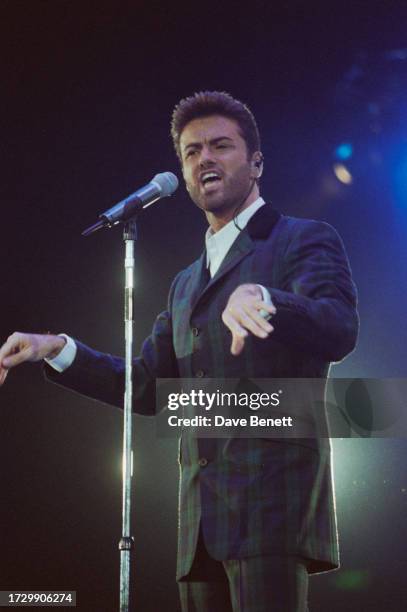 English singer-songwriter George Michael performs on stage at the World Aids Day 'Concert of Hope', Wembley Arena, London, 1st December 1993.