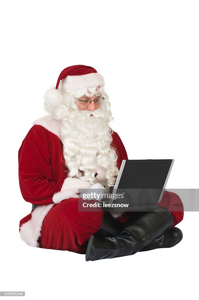 Santa Claus Using a Laptop Computer